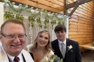 selfie with bride & groom